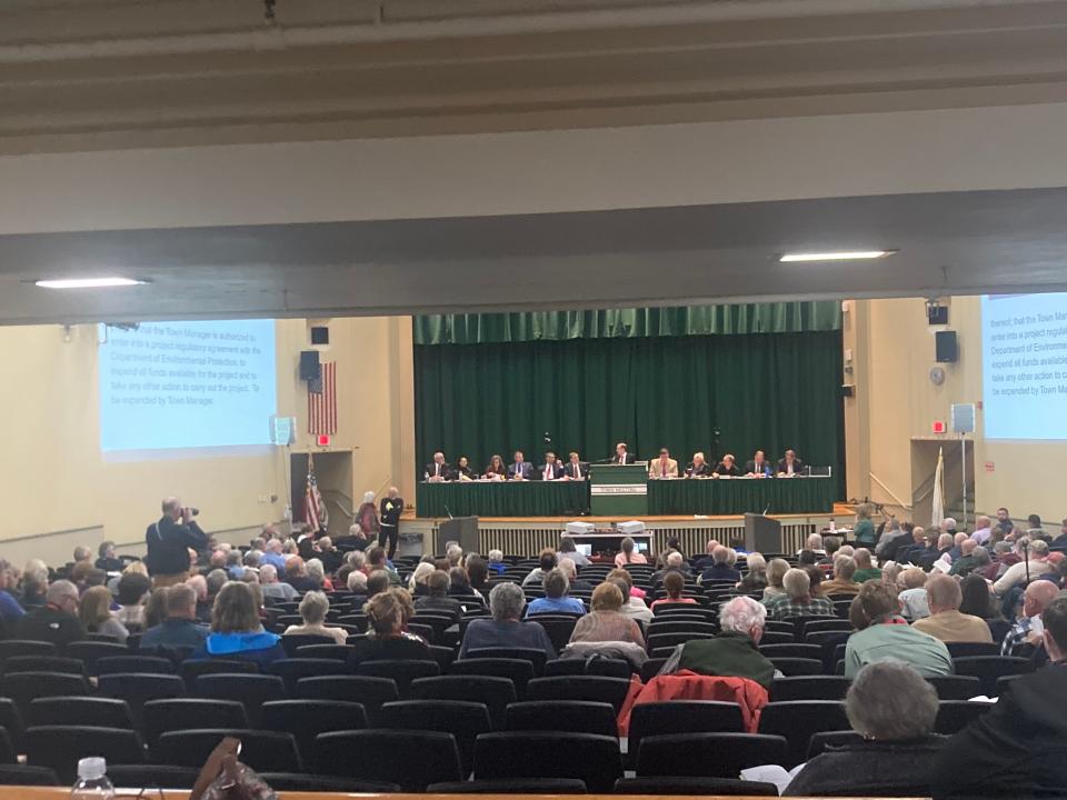 Falmouth residents discuss and vote on articles up for the spring town meeting. Residents passed an article setting up a real estate transfer fee and did not pass an article relating to funding for a urine diversion pilot program.