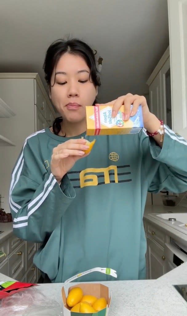 The influencer said it was “so awesome” and put some salt and chili powder onto the lemon snack for taste. TikTok/@lalaleluu
