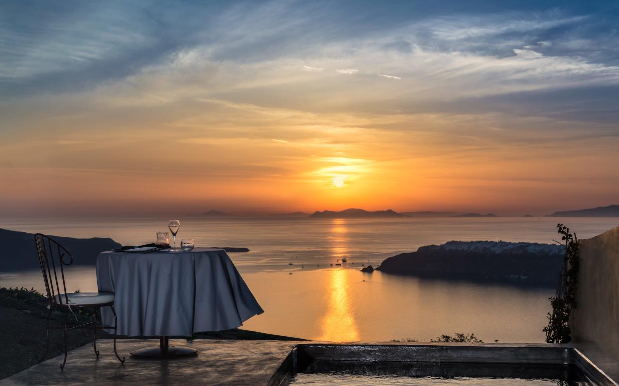 Santorini's famed sunset, enjoyed in solitude from one of the caldera facing rooms at Andronis Concept Wellness Resort - © TRYFON GEORGOPOULOS Photography