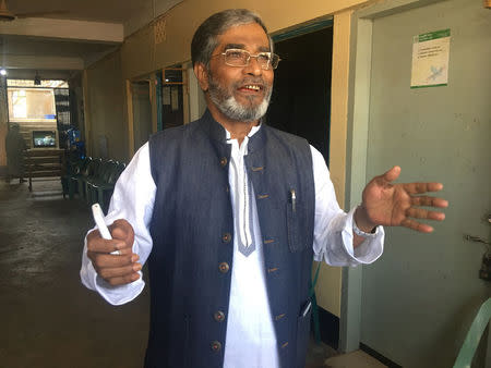 Hamidul Hoque Chowdhury, a school principal and local politician, speaks outside his office in Ukhia, a sub-district of Bangladesh where thousands of Rohingya Muslim refugees live, February 12, 2018. Picture taken February 12, 2018. REUTERS/Andrew RC Marshall