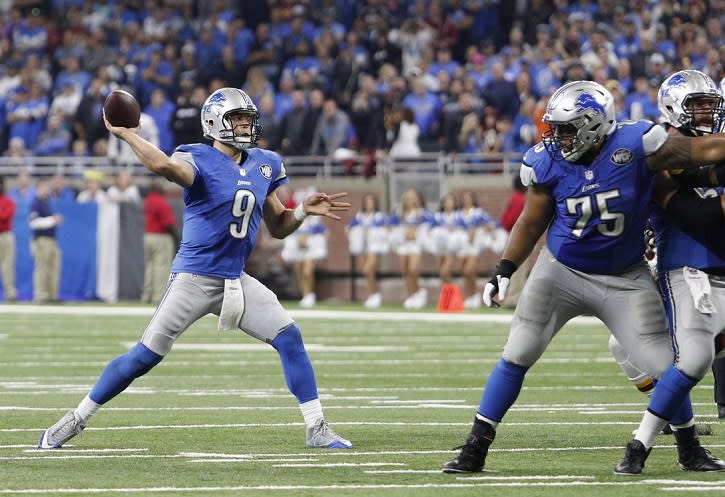 Oct 23, 2016; Detroit, MI, USA; Detroit Lions quarterback Matthew Stafford (9) makes a touchdown pass during the fourth quarter against the Washington Redskins at Ford Field. Lions won 20-17. Mandatory Credit: Raj Mehta-USA TODAY Sports