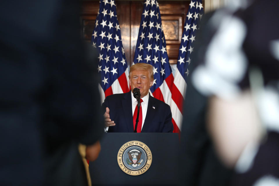 President Donald Trump speaks during an event to present the Presidential Medal of Freedom to Jim Ryun, in the Blue Room of the White House, Friday, July 24, 2020, in Washington. (AP Photo/Alex Brandon)