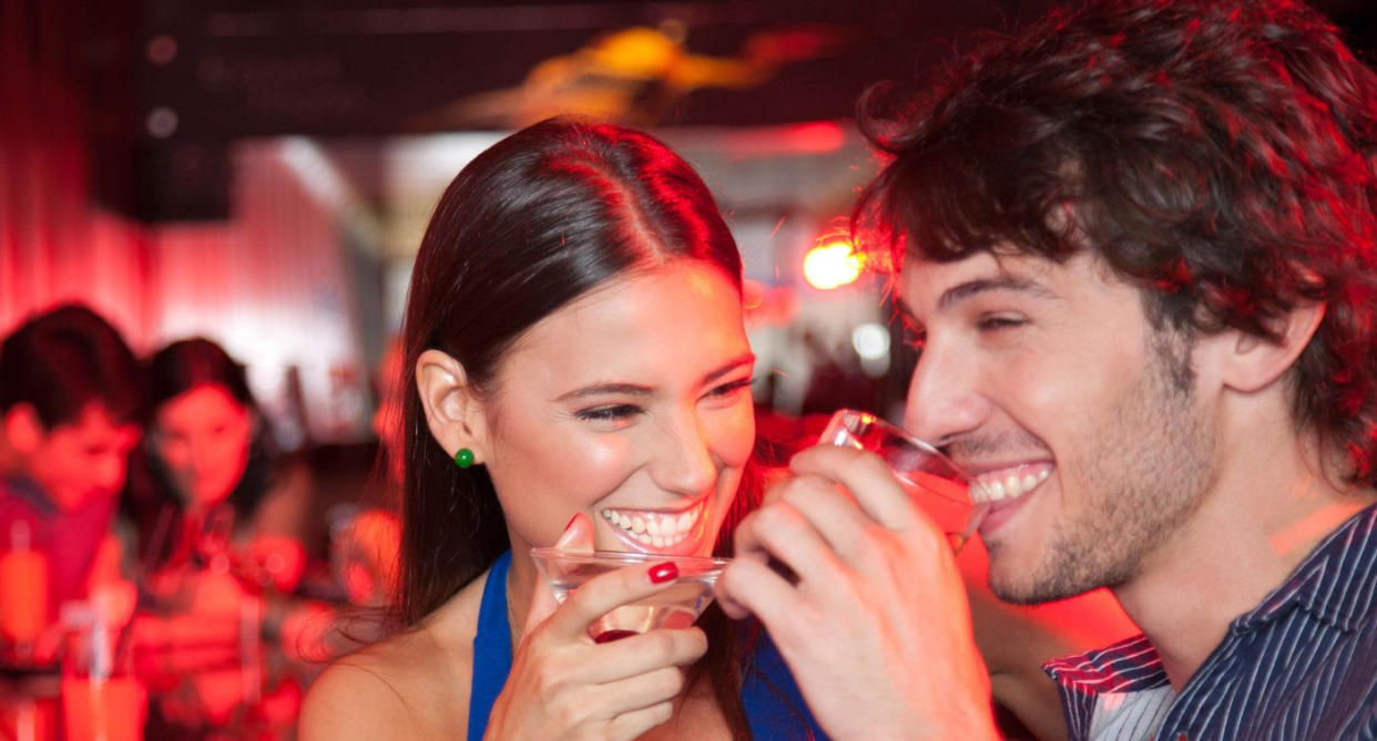 Couple dating in bar (Getty Images)