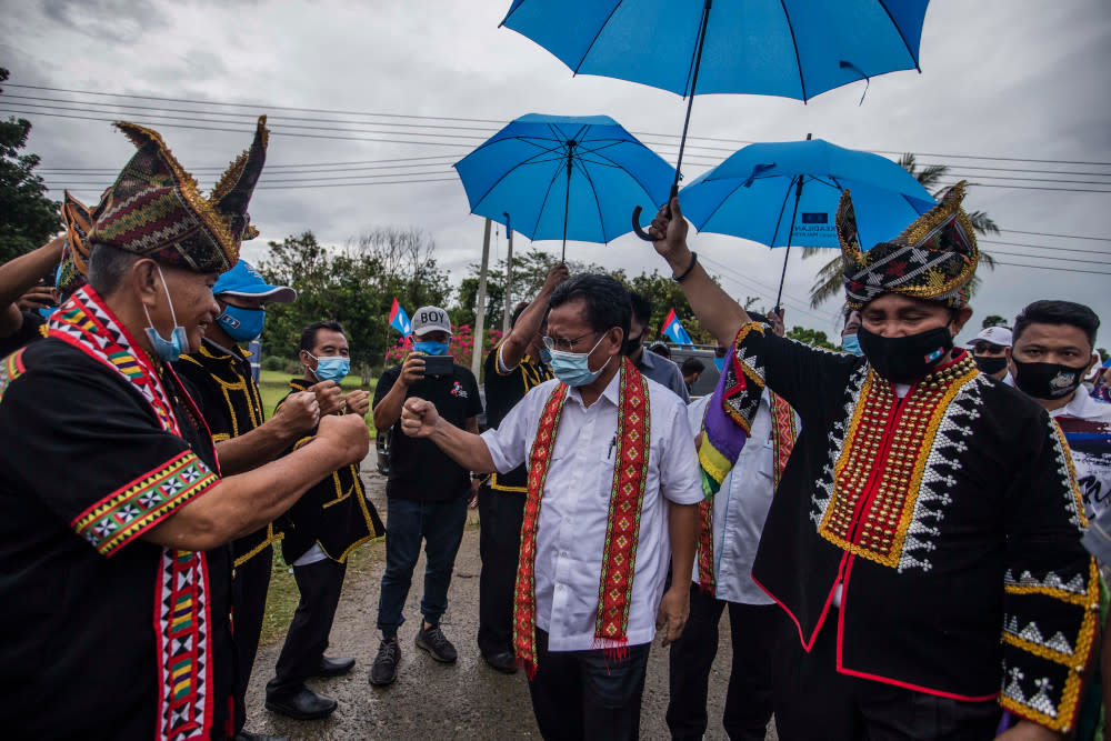 Parti Warisan Sabah president Datuk Seri Mohd Shafie Apdal greets supporters while campaigning in Tempasuk, Kota Belud, Sabah, September 16, 2020. — Picture by Firdaus Latif