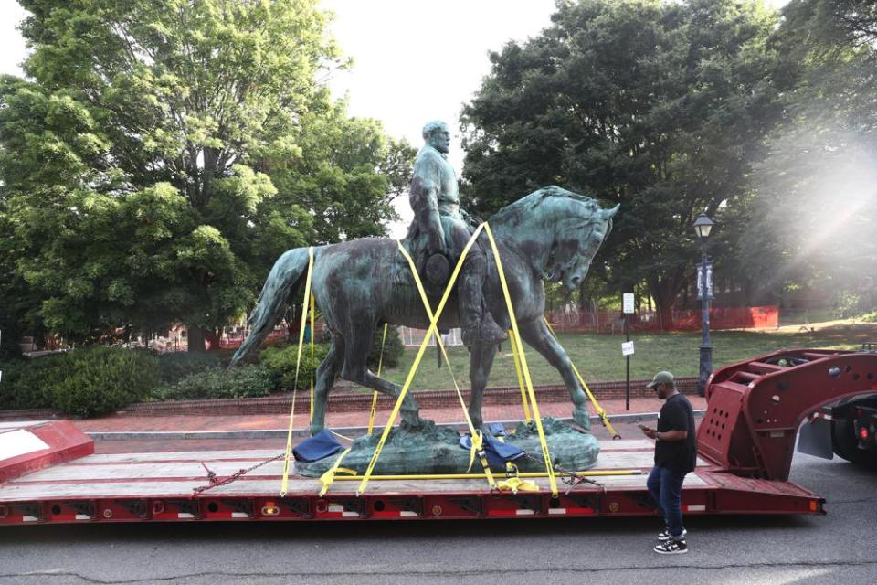 The monument of Robert E. Lee is removed on Saturday, July 10, 2021 in Charlottesville, Va. (Erin Edgerton/The Daily Progress via AP)