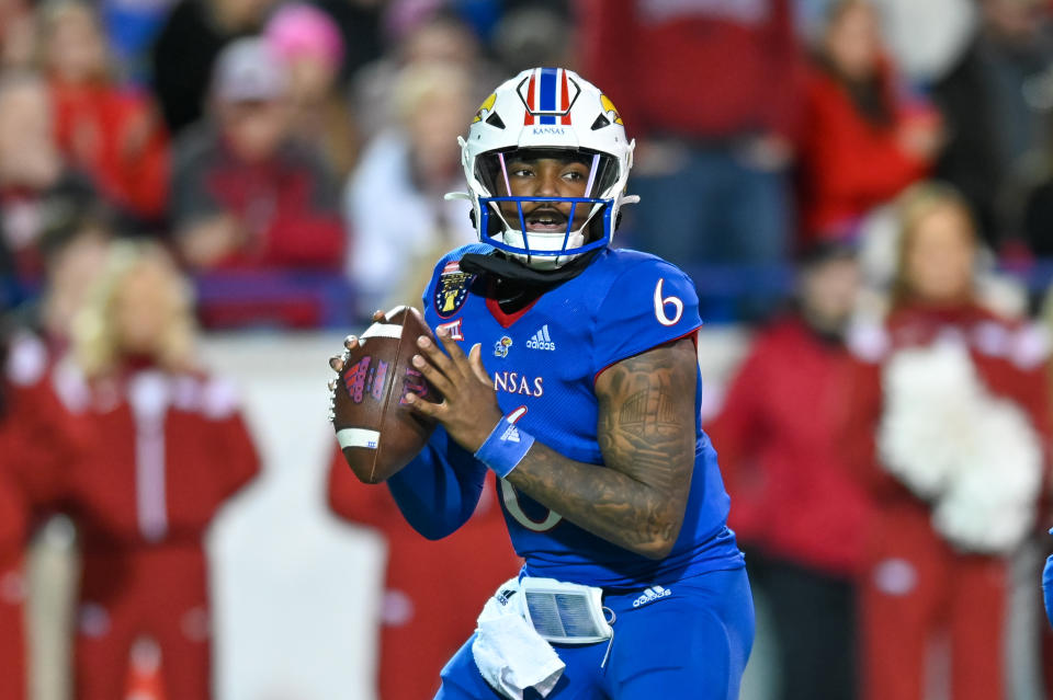 MEMPHIS, TN - DECEMBER 28: Kansas Jayhawks quarterback Jalon Daniels (6) in action during the AutoZone Liberty Bowl between the Kansas Jayhawks and the Arkansas Razorbacks on December 28, 2022 at the Simmons Bank Liberty Stadium in Memphis, TN. (Photo by Kevin Langley/Icon Sportswire via Getty Images)