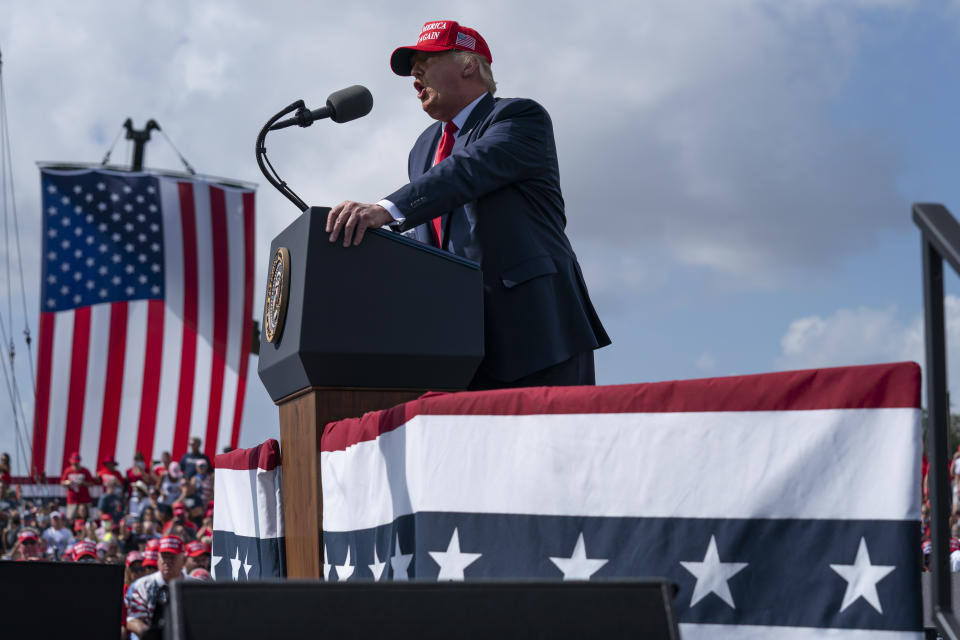 President Donald Trump speaks during a campaign rally outside Raymond James Stadium, Thursday, Oct. 29, 2020, in Tampa. (AP Photo/Evan Vucci)