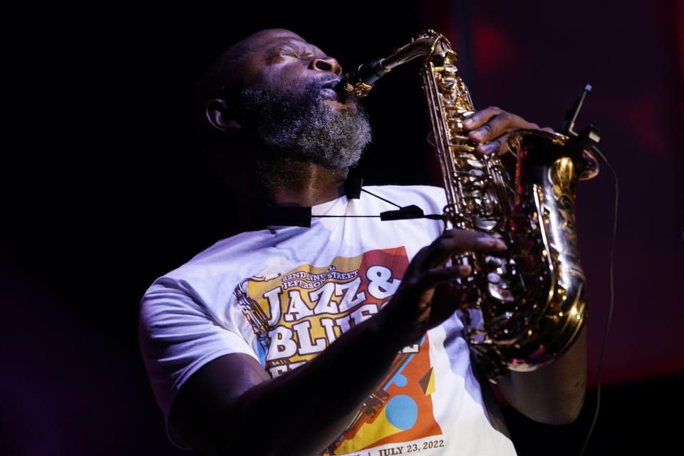 Mike Phillips performs at the Jefferson Street Jazz & Blues Festival July 23, 2022, in Nashville, Tenn. Hundreds of tourism-related projects nationwide, including the festival, collectively are getting about $2.4 billion from the American Rescue Plan, according to an Associated Press analysis of funds flowing from last year's wide-ranging coronavirus relief law. (AP Photo/Mark Humphrey)