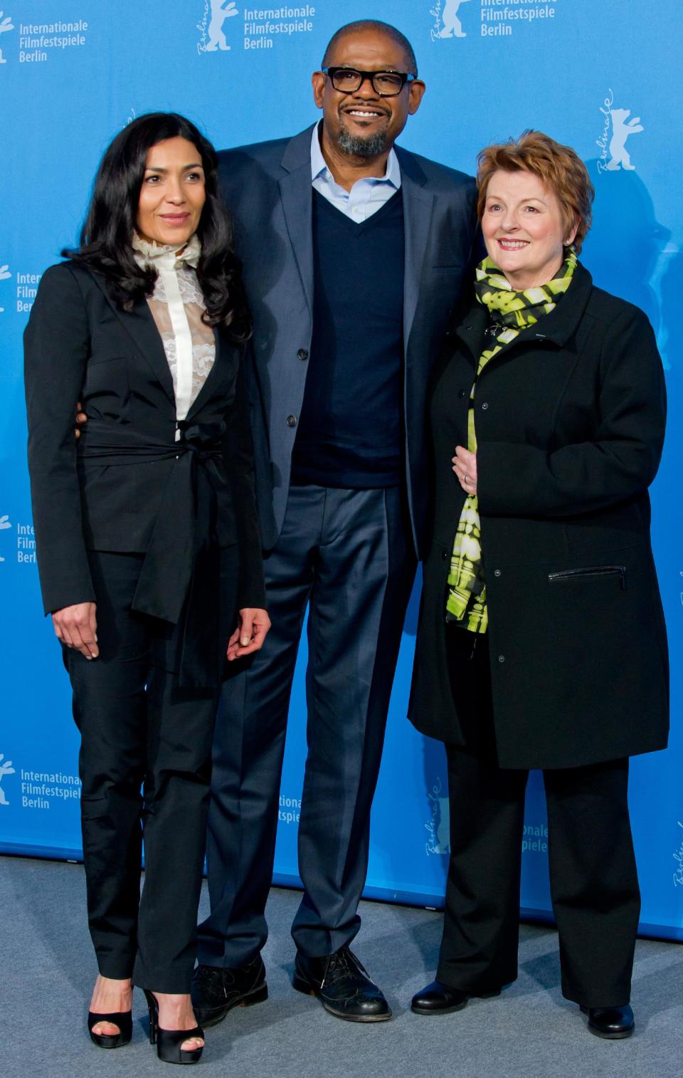 From left, actors Dolores Heredia, Forest Whitaker and actress Brenda Blethyn pose for photographers at the photo call for the film 'Two Men in Town' during the 64th Berlinale International Film Festival, on Friday Feb. 7, 2014, in Berlin. (AP Photo/dpa, Tim Brakemeier)