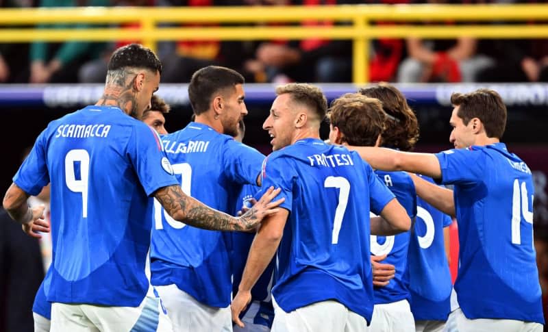 Italy players celebrate their side's second goal during the UEFA Euro 2024 group B soccer match between Italy and Albania at the Dortmund stadium. Bernd Thissen/dpa