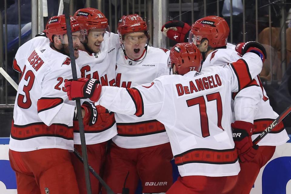 May 13, 2024; New York, New York, USA; Carolina Hurricanes center Evgeny Kuznetsov (92) celebrates his goal against the New York Rangers with teammates during the third period of game five of the second round of the 2024 Stanley Cup Playoffs at Madison Square Garden. Mandatory Credit: Brad Penner-USA TODAY Sports
