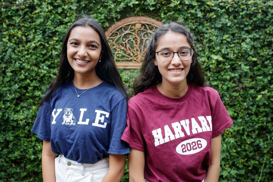 Twin sisters and co-valedictorians at Chiles High School, Surabhi Kumar, who will be attending Yale, and Sandhya, who will be attending Harvard, pose for a photo together Tuesday, April 5, 2022.