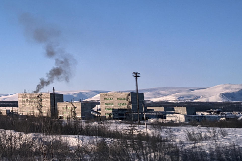 Smoke rises from a building in the town of Kharp, in the Yamalo-Nenetsk region about 1,900 kilometers (1,200 miles) northeast of Moscow, Russia, on Saturday, Feb. 17, 2024. Alexei Navalny, the fiercest foe of Russian President Vladimir Putin who crusaded against official corruption and staged massive anti-Kremlin protests, died in prison Friday Feb. 16, 2024 Russia's prison agency said. He was 47. (AP Photo)