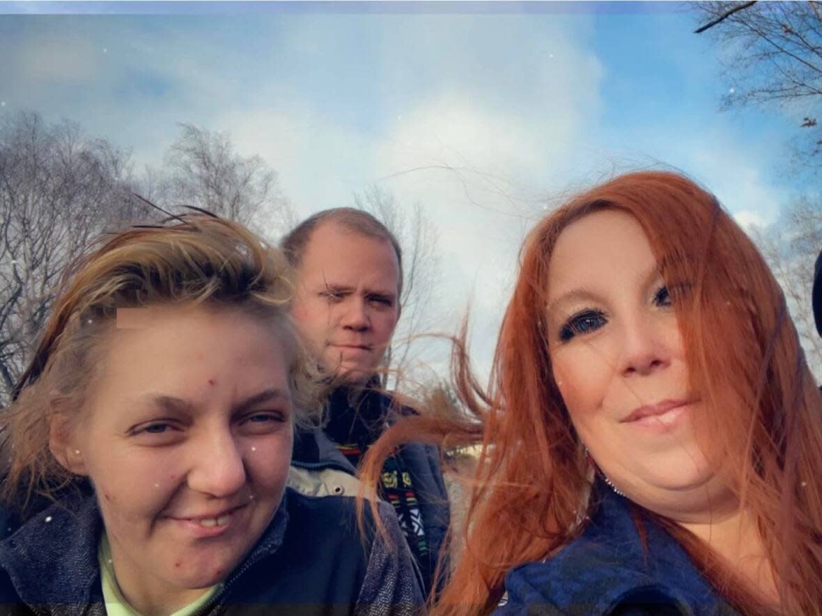 Trish Trecartin, left, with outreach volunteers Kirk Barlow, Joanne Barlow and Anthony Lutz, right. (Submitted by Joanne Barlow - image credit)