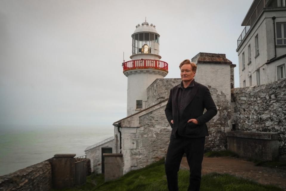 Conan O’Brien visits his ancestral homeland, Ireland, where he goes to a lighthouse. Courtesy of Conaco/Max