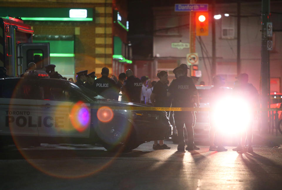 <p>Police officers attend the scene of a mass shooting in Toronto, Canada, July 22, 2018. (Photo: Chris Helgren/Reuters) </p>