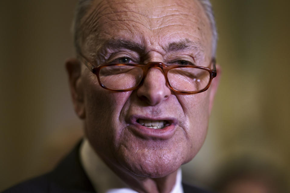 Senate Majority Leader Chuck Schumer, D-N.Y., criticizes Republicans as he speaks to reporters after a weekly policy meeting, at the Capitol in Washington, Tuesday, Sept. 21, 2021. (AP Photo/J. Scott Applewhite)