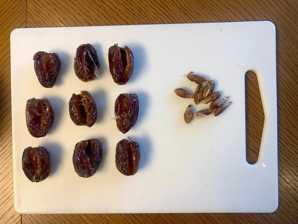 I'd recommend just buying pitted dates to avoid this step.