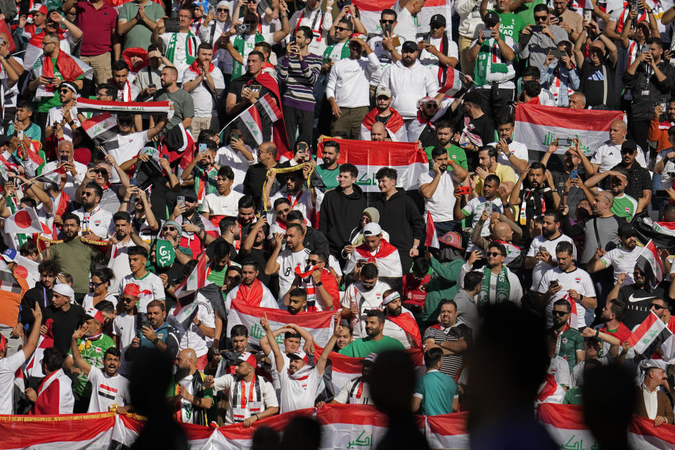 Supporters of Iraq fill the stands as they wait for the start of the Asian Cup Group C soccer match between Iraq and Japan at the Education City Stadium in Al Rayyan, Qatar, Friday, Jan. 19, 2024. (AP Photo/Aijaz Rahi)