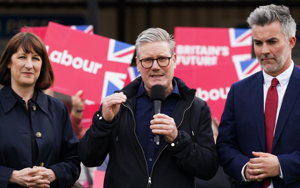 Rachel Reeves, Labour's shadow chancellor of the exchequer and Sir Keir Starmer, Labour leader, with David Skaith, the new mayor for York and North Yorkshire, at Northallerton Town FC's ground on Friday