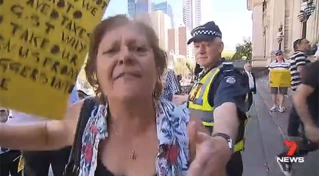 A woman screams down the camera. Picture: 7 News