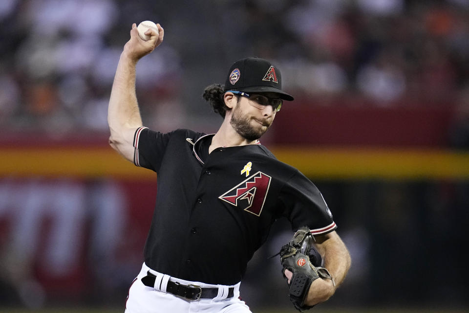 Arizona Diamondbacks starting pitcher Zac Gallen throws against the Baltimore Orioles during the first inning of a baseball game, Sunday, Sept. 3, 2023, in Phoenix. (AP Photo/Ross D. Franklin)