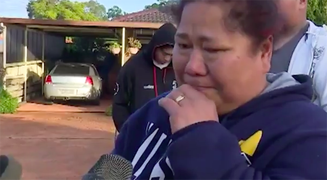 Neighbour Keasi Ngaro almost broke down during a media interview. Her husband rescued the Kbaba family's young daughter. Source: 7 News