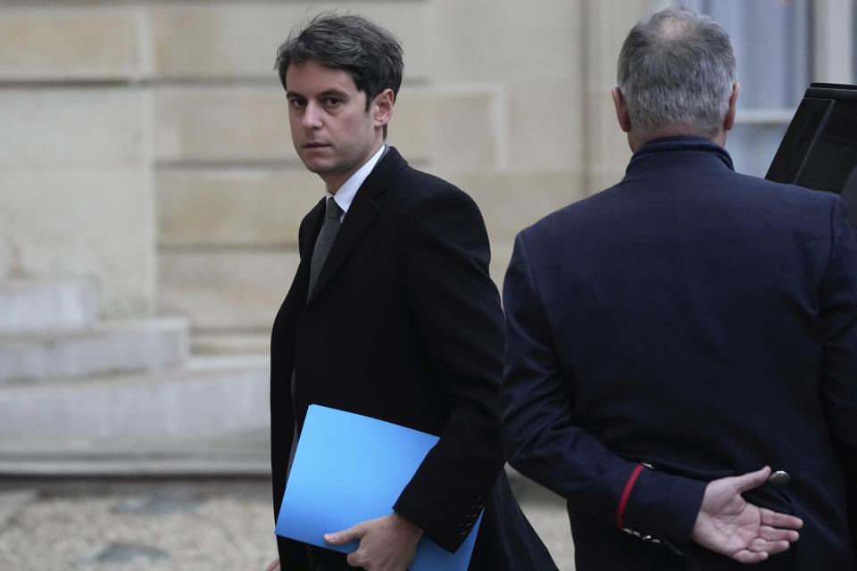New French prime minister Gabriel Attal arrives to attend the weekly cabinet meeting after a cabinet reshuffle at the Elysee Palace in Paris, Friday, Jan. 12, 2024 . (AP Photo/Michel Euler)