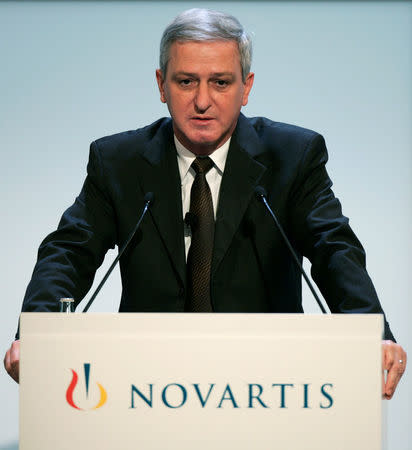 Novartis' Joerg Reinhardt makes a speech during the 2006 annual results of the drugmaking company during a news conference in Basel, Switzerland January 18, 2007. REUTERS/Vincent Kessler/File Photo