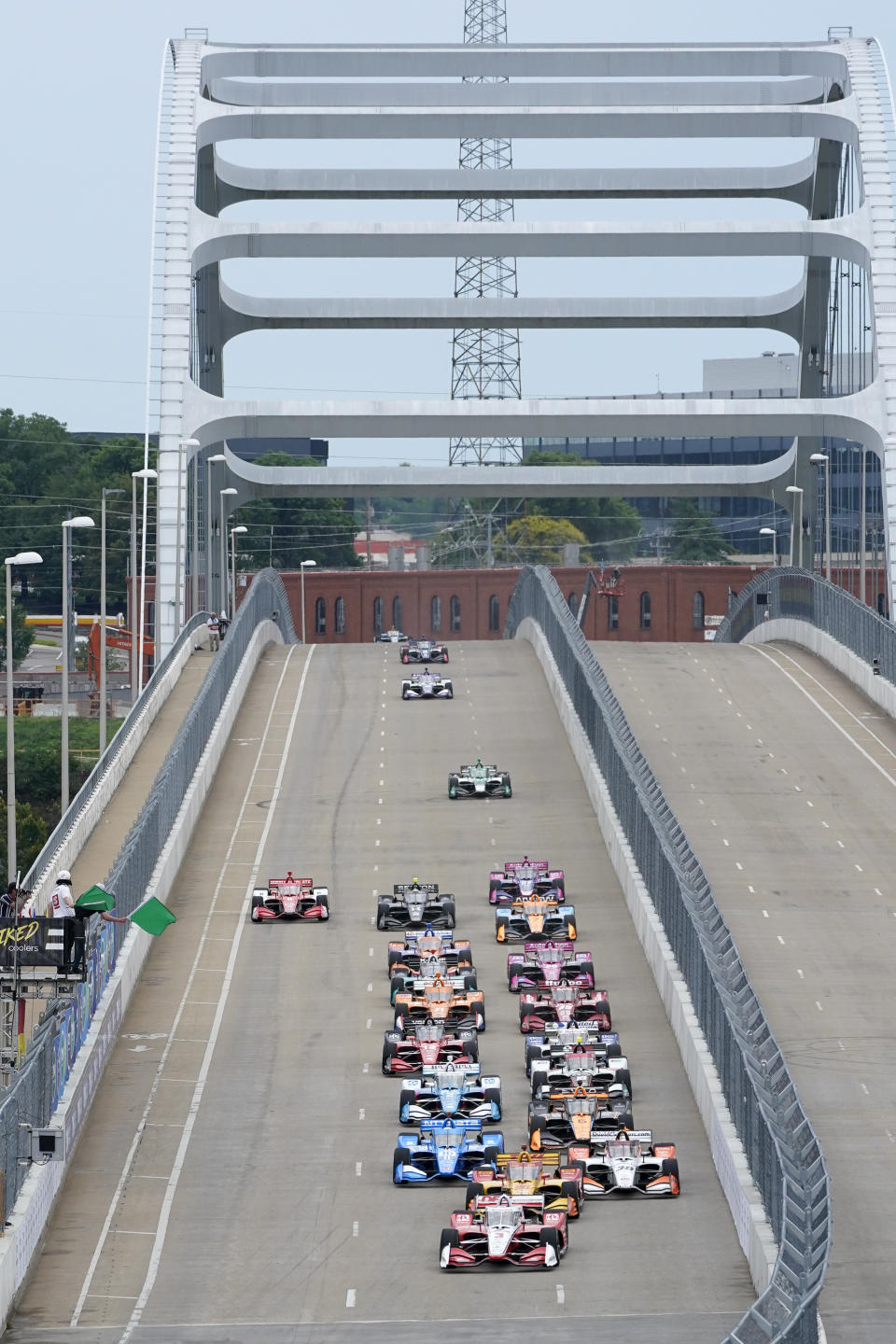 Drivers take the green flag at the start of the Music City Grand Prix auto race Sunday, Aug. 7, 2022, in Nashville, Tenn. (AP Photo/Mark Humphrey)