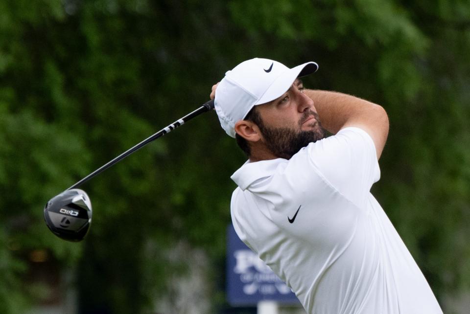 Scottie Scheffler tees off on the 10th hole during a practice round for the PGA Championship golf tournament at Valhalla Golf Club.