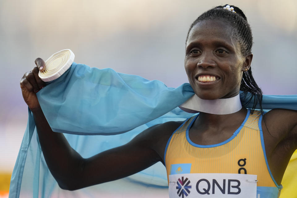 Gold medalist Norah Jeruto, of Kazakhstan, celebrates after her win in the women's 3000-meter steeplechase final at the World Athletics Championships on Wednesday, July 20, 2022, in Eugene, Ore. (AP Photo/Ashley Landis)