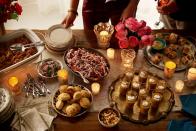 <p>Hosting your friends and family for the holidays doesn't have to break the bank. This delicious, crowd-pleasing party menu is simple, fun, and easy on your wallet.</p><p><strong>Appetizers:</strong><br><a href="https://www.countryliving.com/food-drinks/recipes/a3262/roasted-winter-squash-soup-recipe/" rel="nofollow noopener" target="_blank" data-ylk="slk:Roasted Winter Squash Soup;elm:context_link;itc:0;sec:content-canvas" class="link ">Roasted Winter Squash Soup</a></p><p><a href="https://www.countryliving.com/food-drinks/recipes/a3263/pigs-in-blanket-recipe/" rel="nofollow noopener" target="_blank" data-ylk="slk:Pigs in Blankets;elm:context_link;itc:0;sec:content-canvas" class="link ">Pigs in Blankets</a></p><p><a href="https://www.countryliving.com/food-drinks/recipes/a3265/pulled-pork-biscuits-recipe/" rel="nofollow noopener" target="_blank" data-ylk="slk:Pulled Pork in Biscuits;elm:context_link;itc:0;sec:content-canvas" class="link ">Pulled Pork in Biscuits</a></p><p><a href="https://www.countryliving.com/food-drinks/recipes/a3264/smoky-popcorn-recipe/" rel="nofollow noopener" target="_blank" data-ylk="slk:Smoky Popcorn;elm:context_link;itc:0;sec:content-canvas" class="link ">Smoky Popcorn</a></p><p><a href="https://www.countryliving.com/food-drinks/recipes/a3293/spicy-rosemary-peanuts-recipe/" rel="nofollow noopener" target="_blank" data-ylk="slk:Spicy Rosemary Peanuts;elm:context_link;itc:0;sec:content-canvas" class="link ">Spicy Rosemary Peanuts</a></p><p><strong>Dessert:</strong><br><a href="https://www.countryliving.com/food-drinks/recipes/a3287/mini-bread-puddings-recipe/" rel="nofollow noopener" target="_blank" data-ylk="slk:Mini Bread Puddings;elm:context_link;itc:0;sec:content-canvas" class="link ">Mini Bread Puddings</a></p><p><strong>Trio of Cocktails:</strong> <br><a href="https://www.countryliving.com/food-drinks/recipes/a3295/cranberry-cava-cocktails-recipe/" rel="nofollow noopener" target="_blank" data-ylk="slk:Cranberry Cava Cocktail;elm:context_link;itc:0;sec:content-canvas" class="link ">Cranberry Cava Cocktail</a></p><p><a href="https://www.countryliving.com/food-drinks/recipes/a3291/tropical-bourbon-punch-recipe/" rel="nofollow noopener" target="_blank" data-ylk="slk:Tropical Bourbon Punch;elm:context_link;itc:0;sec:content-canvas" class="link ">Tropical Bourbon Punch</a></p><p><a href="https://www.countryliving.com/food-drinks/recipes/a3290/warm-bourbon-cider-recipe/" rel="nofollow noopener" target="_blank" data-ylk="slk:Warm Bourbon Cider;elm:context_link;itc:0;sec:content-canvas" class="link ">Warm Bourbon Cider</a></p>