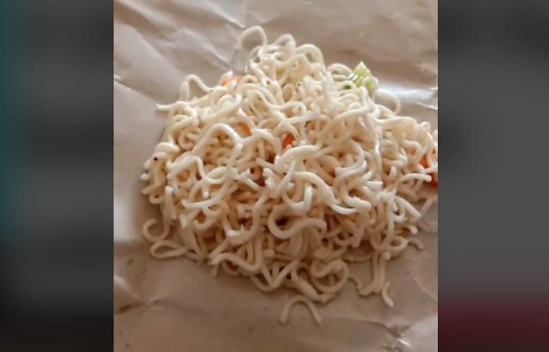 TikTok user Adam Azali couldn’t hide his disdain for his daughter’s miserable-looking school meal. ― Screengrab from TikTok/@adamazali0