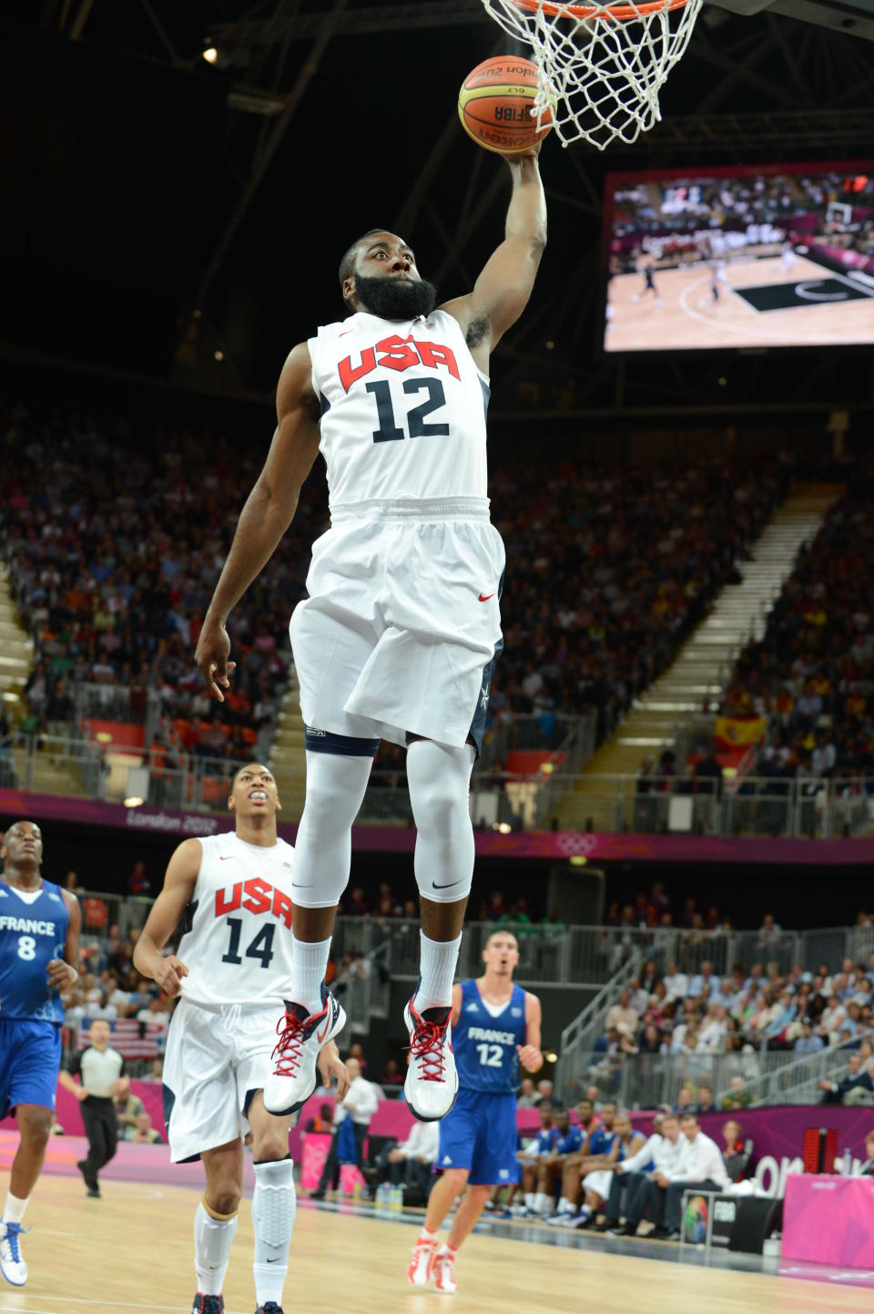 LONDON, ENGLAND - JULY 29:James Harden #12 of the United States dunks versus France at the Olympic Park Basketball Arena during the London Olympic Games on July 29, 2012 in London, England. NOTE TO USER: User expressly acknowledges and agrees that, by downloading and/or using this Photograph, user is consenting to the terms and conditions of the Getty Images License Agreement. Mandatory Copyright Notice: Copyright 2012 NBAE (Photo by Garrett W. Ellwood/NBAE via Getty Images)