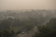 <p>Morning haze and smog envelops the skyline in New Delhi, India, Friday, Nov. 5, 2021. New Delhi's pollution crisis worsened on Sunday as air quality hit dangerous levels, a problem that rears its head every winter. (AP Photo/Altaf Qadri)</p> 