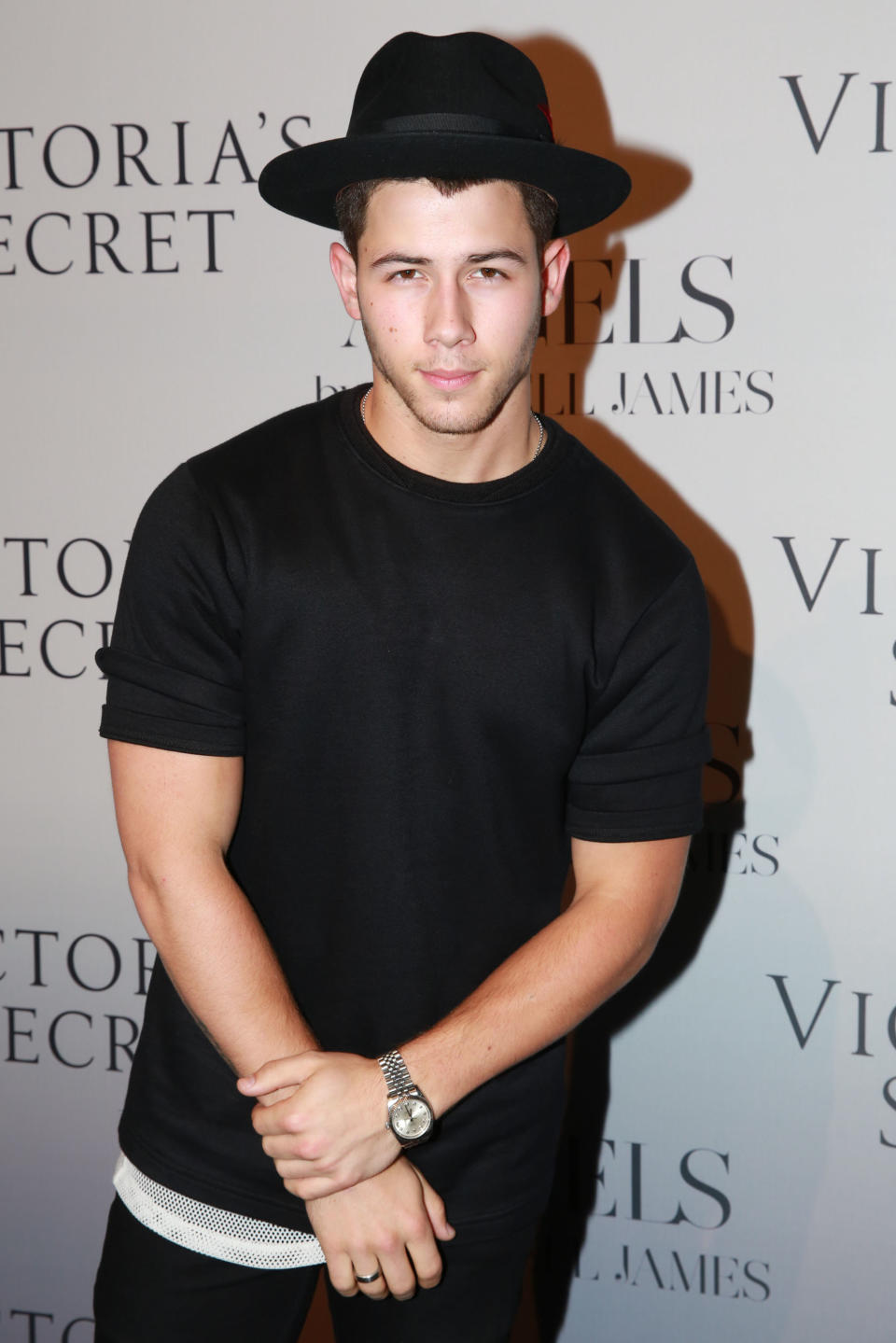 Nick Jonas arrives at a gallery exhibition for photographer Russell James' new book, "Angels", at the Stephan Weiss Studios on Wednesday, Sept. 10, 2014, in New York. (Photo by Amy Sussman/Invision/AP)