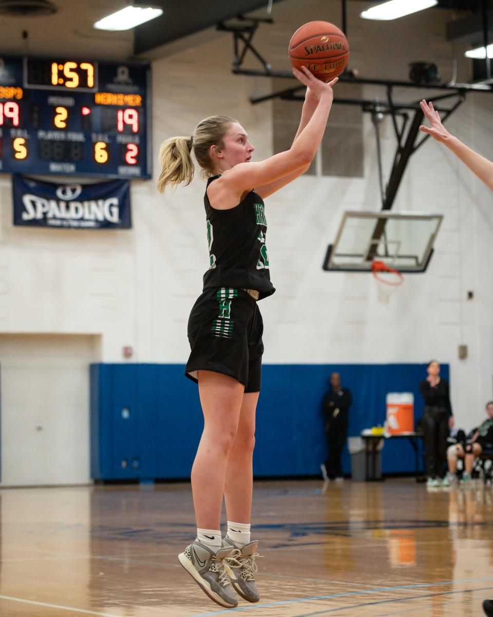 Herkimer's Madison Marusic takes a shot during the semifinal game of the 2022-23 Section III Class C Sectional Championships at Onondaga Community College in Syracuse on Sunday, February 26, 2023.