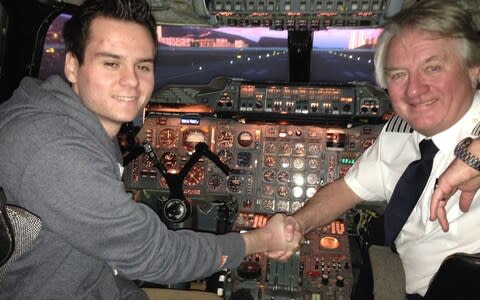 Captain Mike Bannister shakes the hand of Joe Finnis - Credit: Facebook