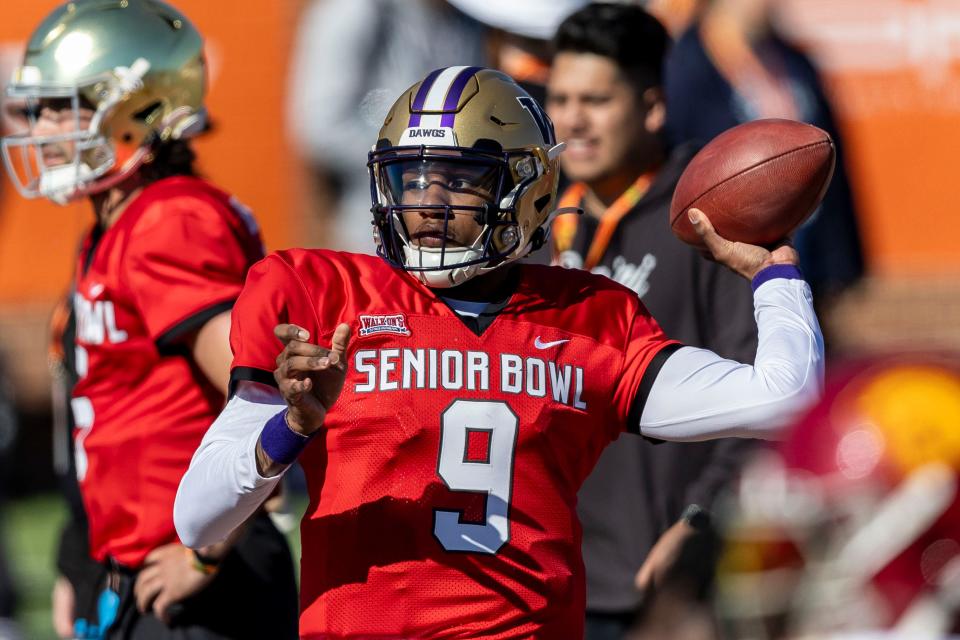 National quarterback Michael Penix Jr. of Washington (9) throws the ball during practice for the National team at Hancock Whitney Stadium.