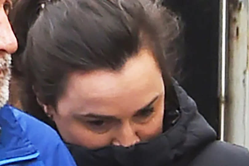 Hayley Robb at court on Friday in a black coat with some of her face obscured