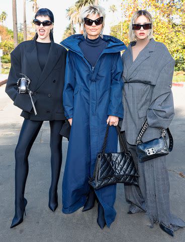 <p>Stefanie Keenan/Getty Images for Balenciaga</p> Amelia Gray Hamlin, Lisa Rinna and Delilah Belle Hamlin attend the Balenciaga fall 2024 Show on December 2, 2023