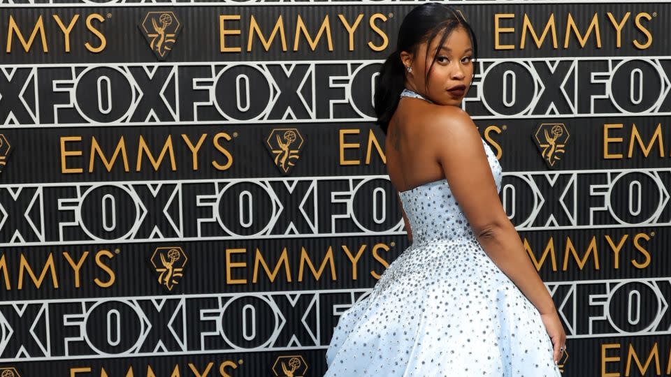 Actor Dominique Fishback, who was nominated for her performance in “Swarm,” stood out in a powder-blue Miu Miu princess gown with jewel detailing. - Aude Guerrucci/Reuters