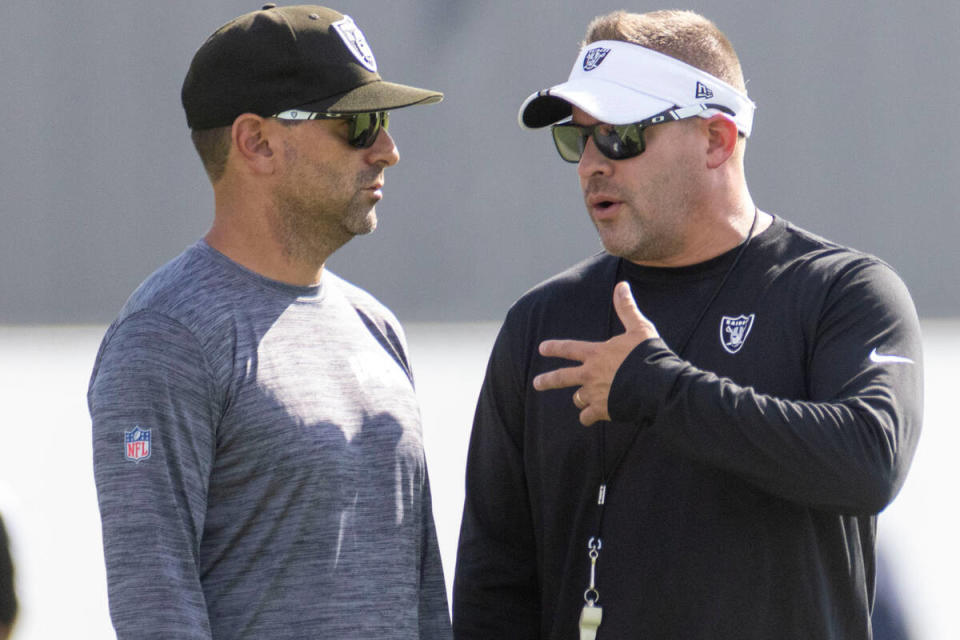Head coach Josh McDaniels (right), general manager Dave Ziegler and the Raiders tried to capitalize on the momentum of a 2021 playoff appearance last season. Now they're heading in a new direction. (Heidi Fang/Las Vegas Review-Journal/Tribune News Service via Getty Images)