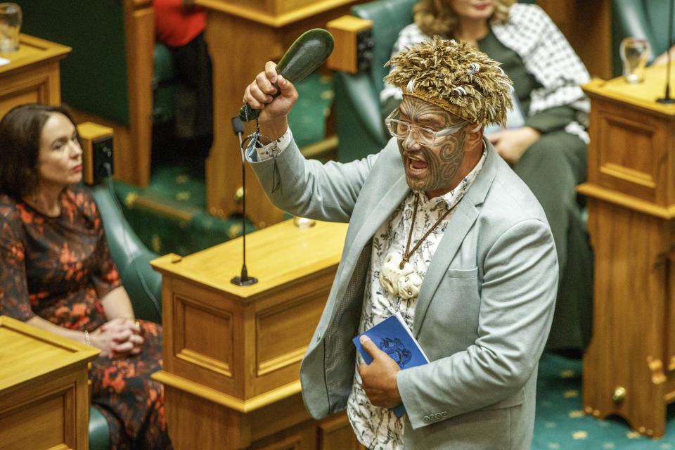 Te Pati Maori co-leader Rawiri Waiti gestures during the Swearing-in ceremony at Parliament in Wellington, New Zealand, Tuesday, Dec. 5, 2023. Thousands of protesters rallied against the New Zealand government's Indigenous policies on Tuesday as the Parliament convened for the first time since October elections. (Mark Mitchell/New Zealand Herald via AP)