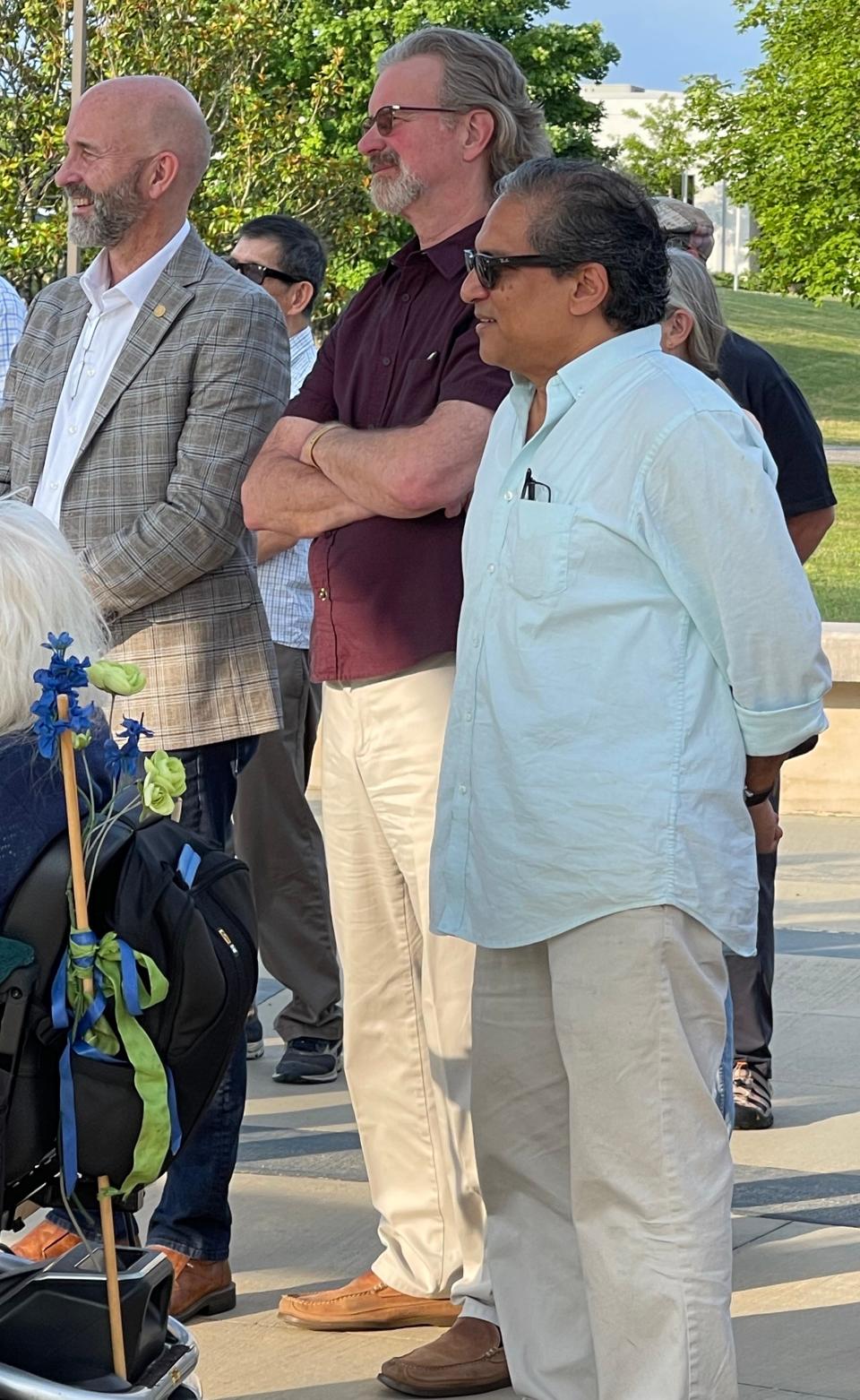 Ram Uppuluri Jr., right to left, Shigeko’s son, Wayne Blasius, city of Oak Ridge planning and development director, and Jim Dodson, a member of City Council, shared their memories with the dozens of people attending the celebration of Shigeko Uppuluri’s life at the International Friendship Bell on June 15, 2023.