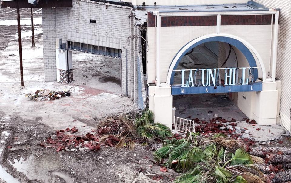 Debris and signage at the Laguna Hills Mall, which will be turned into a mixed-use development.