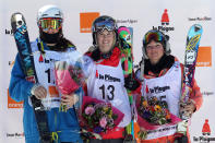 LA PLAGNE, FRANCE - MARCH 20: (FRANCE OUT) Sarah Burke of Canada takes 1st place, Devin Logan of USA takes 2nd place, Anais Caradeux of France takes 3rd place during the FIS Freestyle World Cup Men's and Women's Halfpipe on March 20, 2011 in La Plagne, France. (Photo by Christophe Pallot/Agence Zoom/Getty Images)