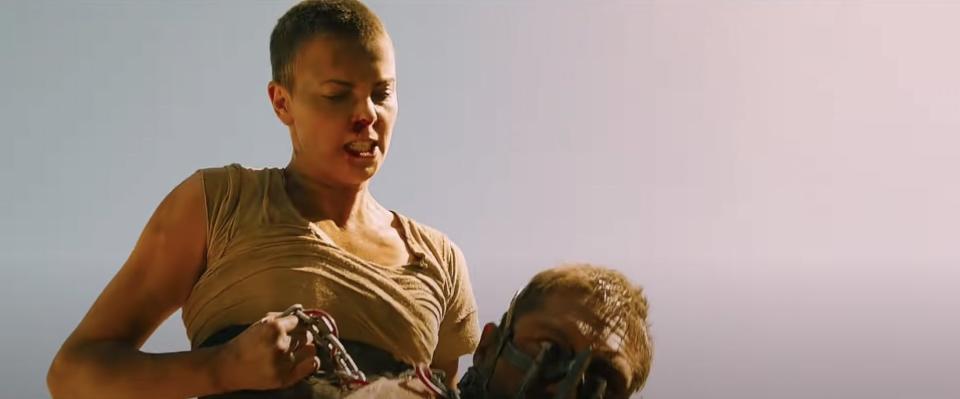 Furiosa chokes Mad Max with his chain