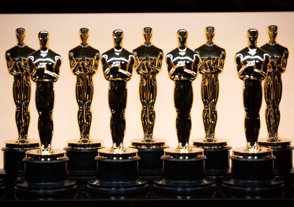 Oscar trophies are prepared backstage during the 94th Academy Awards in 2022.